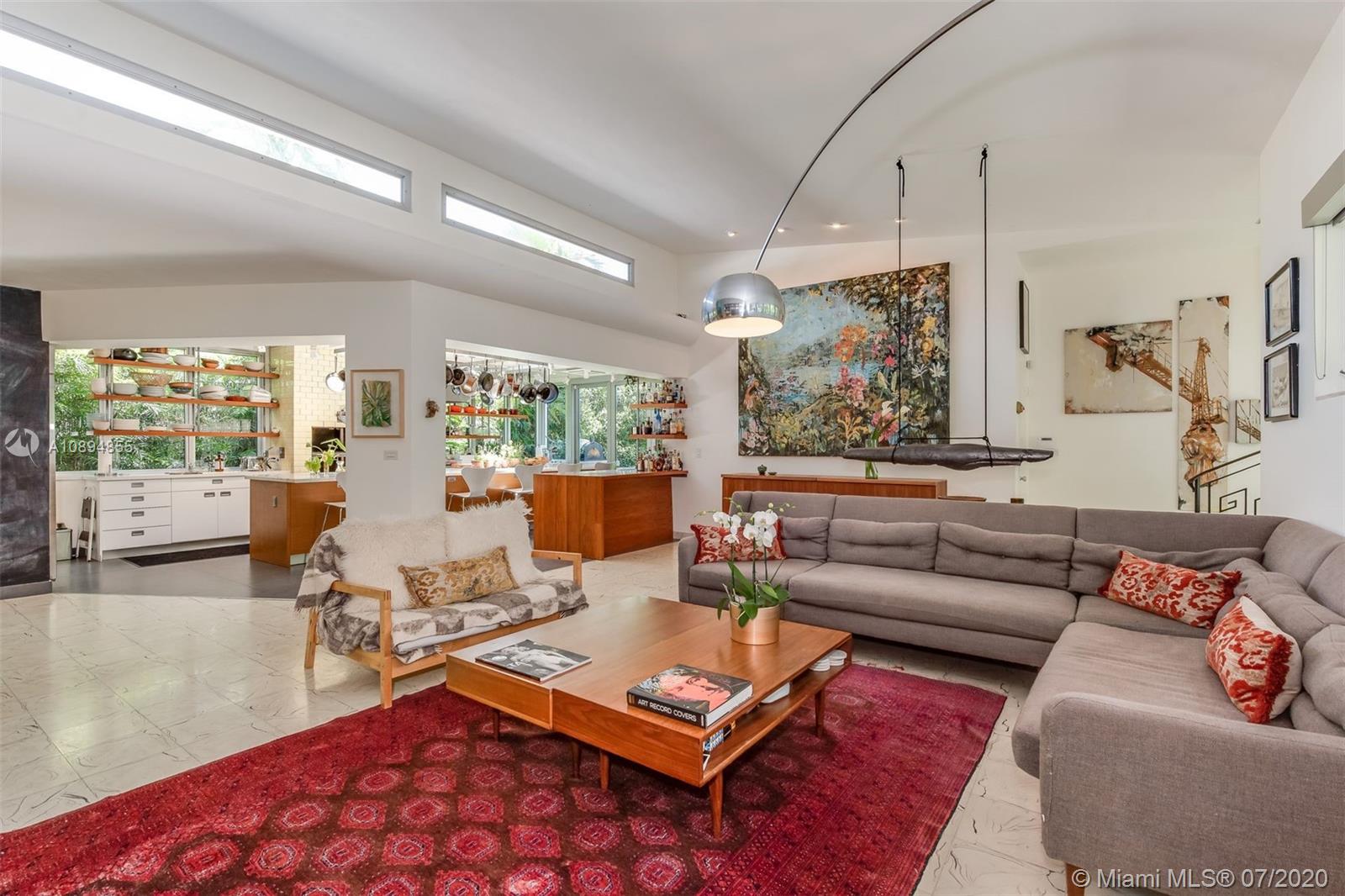 2801 Fairgreen Drive Miami Beach, FL 33140 - Photo 7 of 47 a living room with furniture rug and window