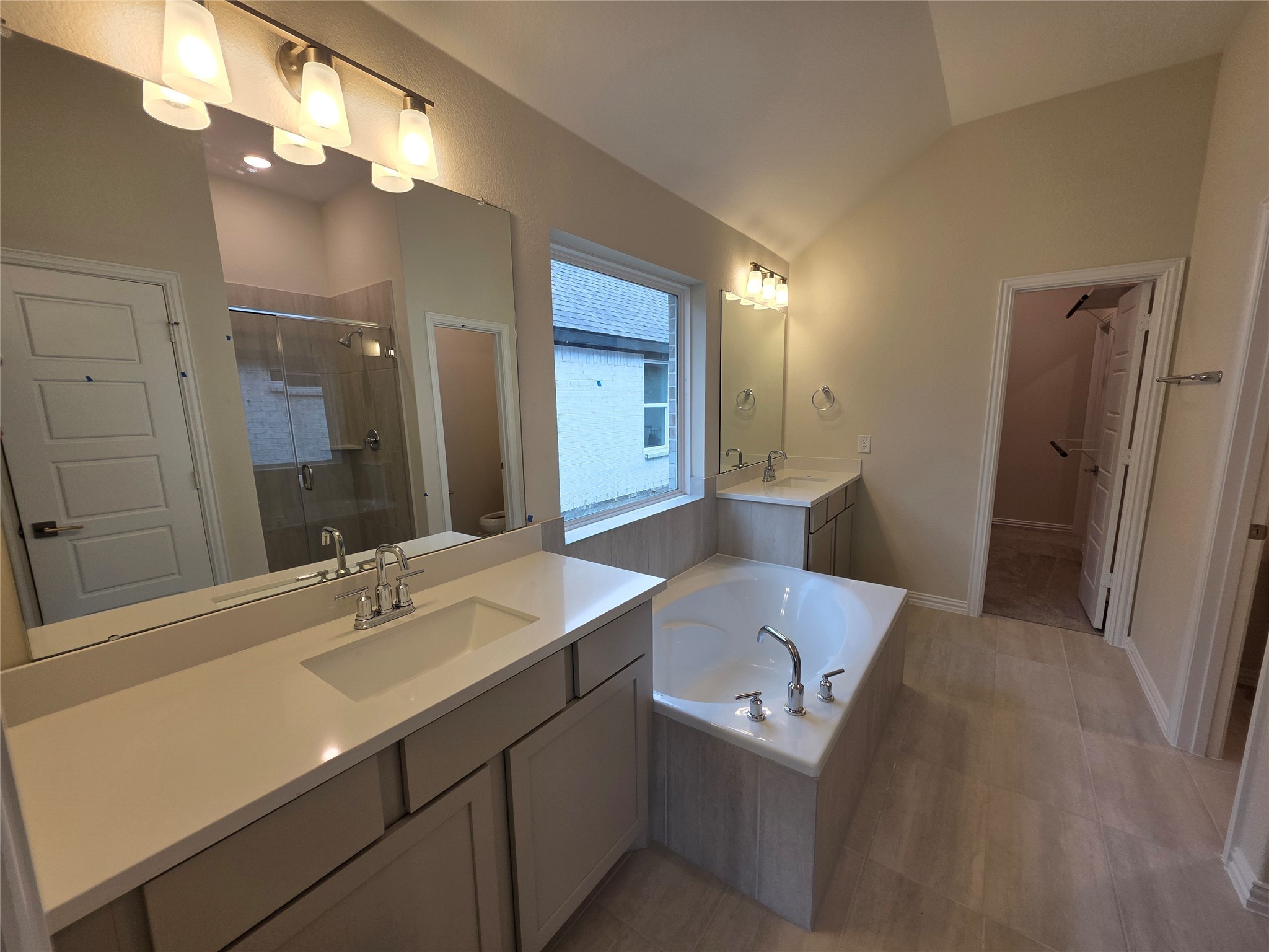 807 Evergreen Frst Lane Rosharon, TX 77583 - Photo 16 of 18 a bathroom with a sink double vanity granite and a mirror