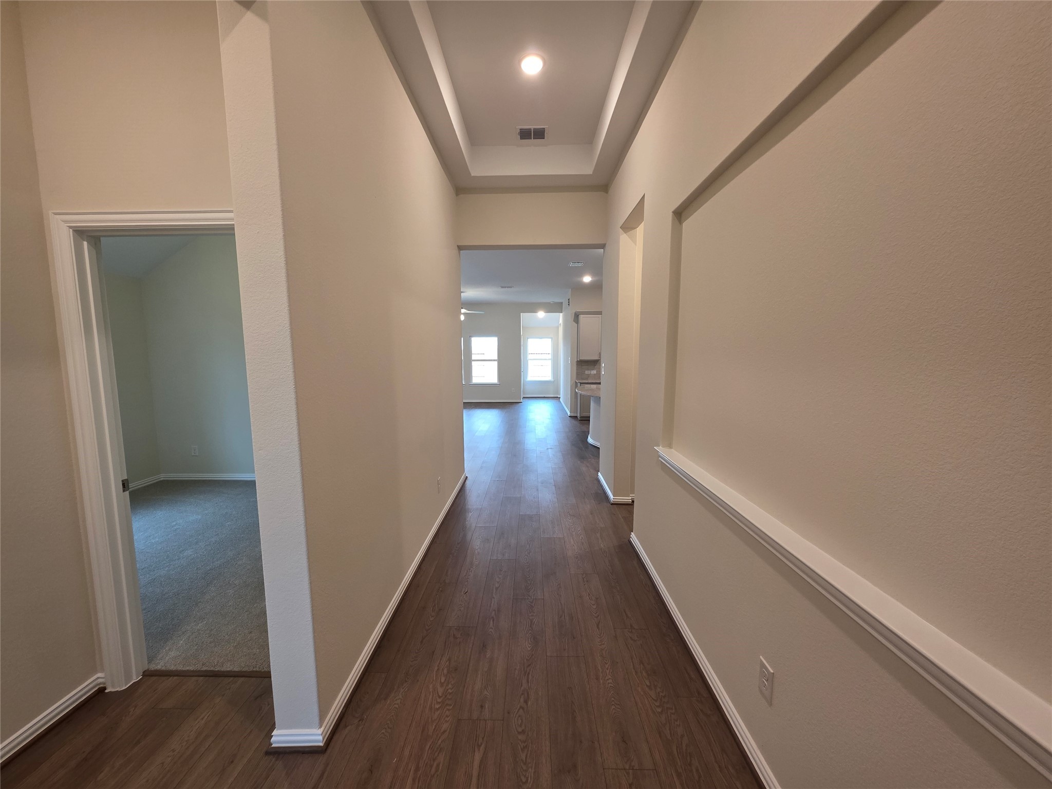 807 Evergreen Frst Lane Rosharon, TX 77583 - Photo 3 of 18 a view of a hallway with wooden floor and staircase