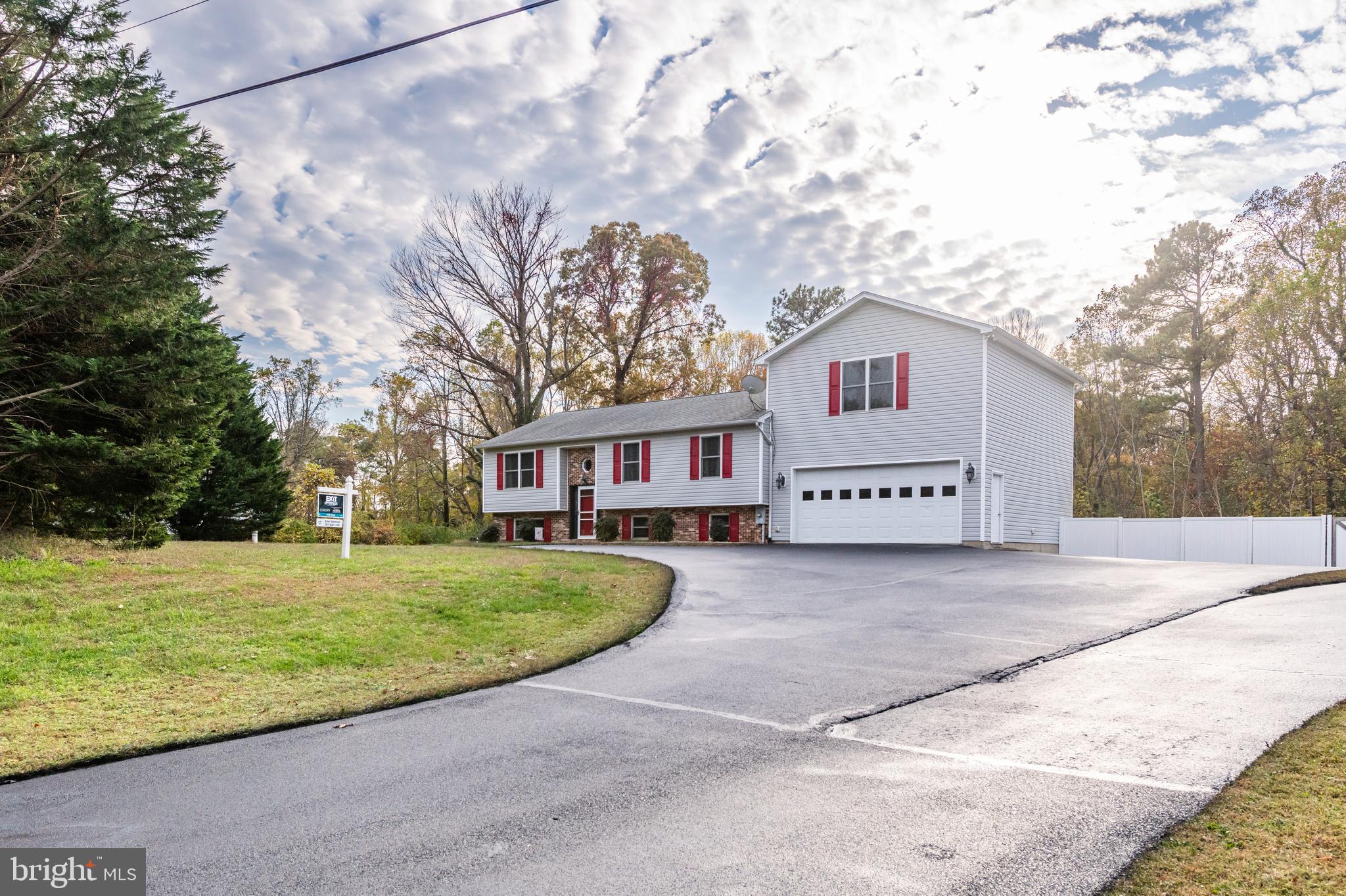 7019 Saw Mill Road Lusby, MD 20657 - Photo 3 of 64 Driveway-Newly sealed! Tons of Parking