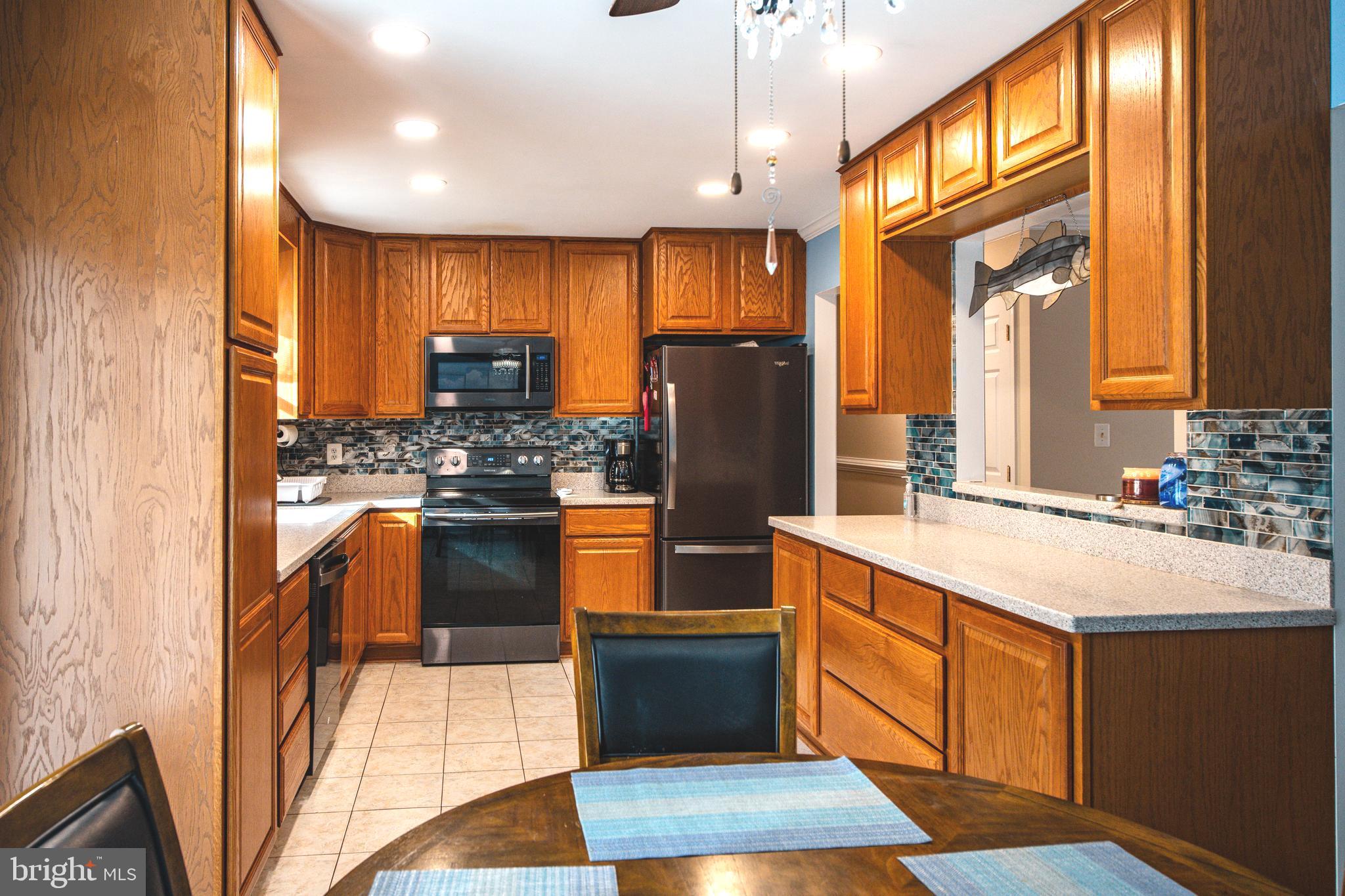 7019 Saw Mill Road Lusby, MD 20657 - Photo 8 of 64 Corian Countertops!