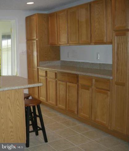 7679 Pine Knob Road Pasadena, MD 21122 - Photo 14 of 40 KITCHEN - GRANITE COUNTERS