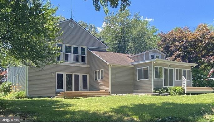7679 Pine Knob Road Pasadena, MD 21122 - Photo 3 of 40 REA ELEVATION = 2 DECKS