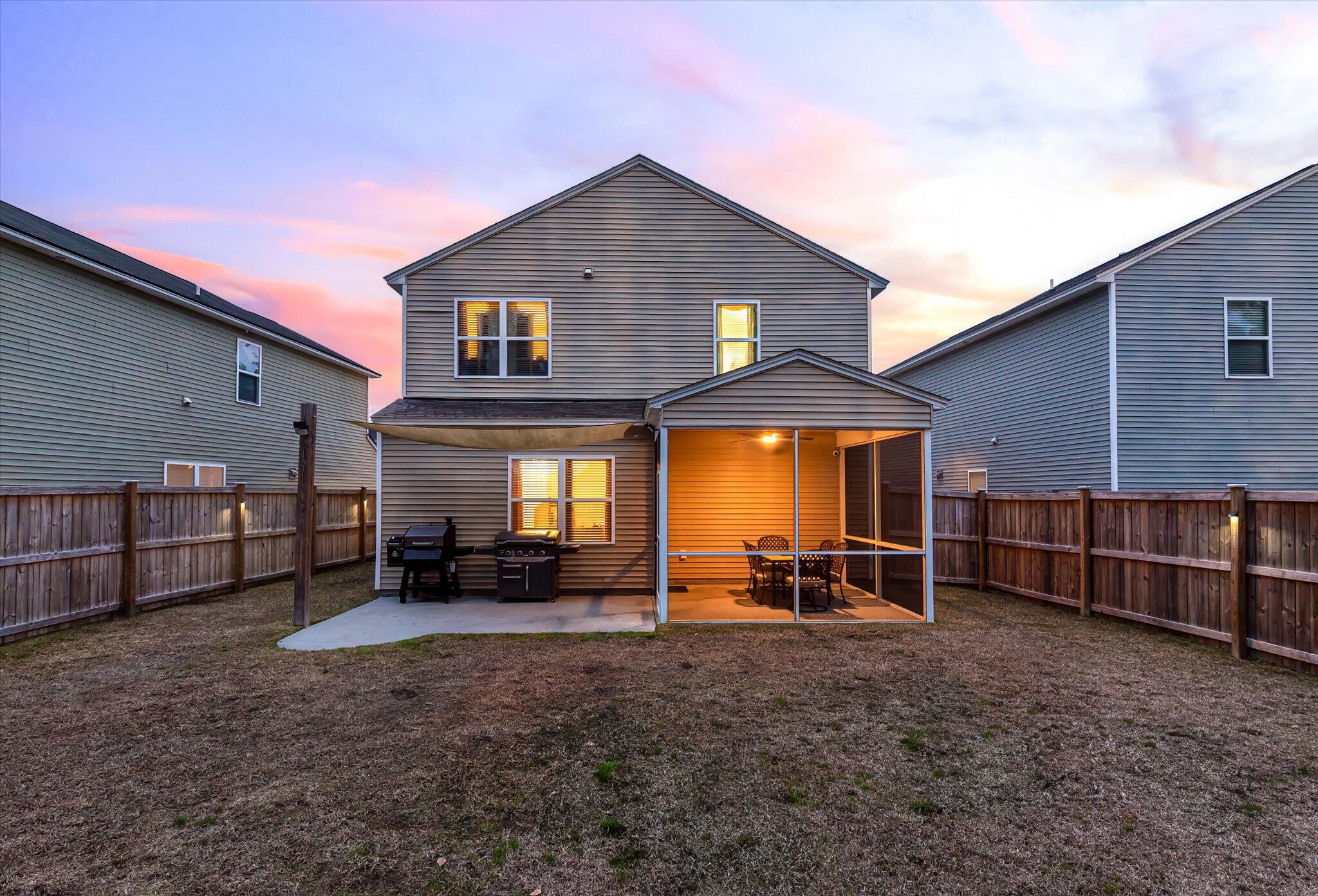 341 Iveson Road Summerville, SC 29486 - Photo 34 of 86 Add a fireplace & adirondack chairs