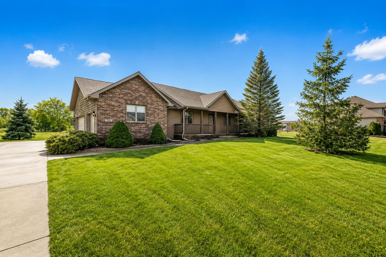 5005 West 152nd Court Crown Point, IN 46307 - Photo 1 of 22 a front view of a house with garden