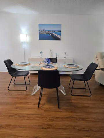 a view of a workspace with furniture