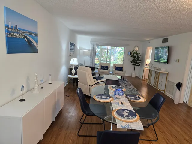 a view of entryway and hall with furniture
