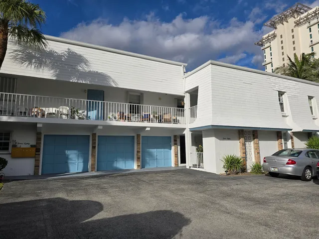 a view of a car park in front of building