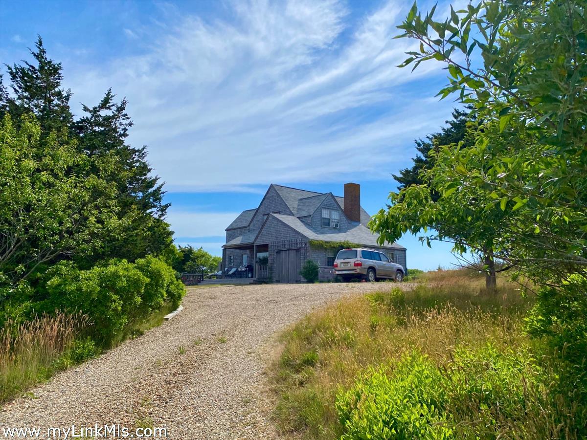 13 Eat Fire Spring Road Nantucket, MA 02554 - Photo 3 of 43 a view of a house with a big yard and large tree