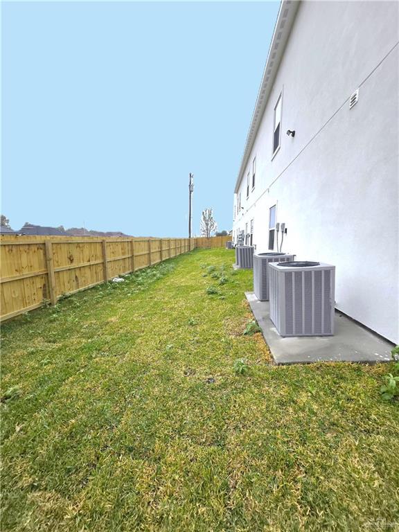 3201 Magdalena Street, Unit 9 Mission, TX 78573 - Photo 11 of 12 a view of an outdoor space and a yard