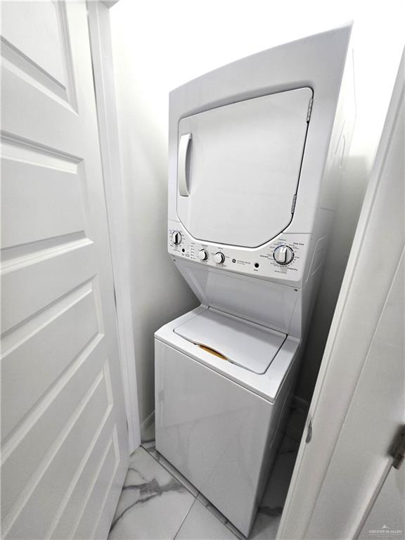 3201 Magdalena Street, Unit 9 Mission, TX 78573 - Photo 4 of 12 a utility room with dryer and washer