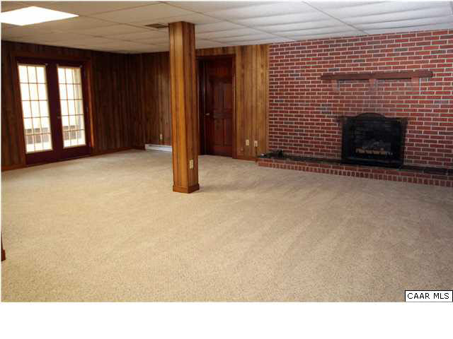 6915 Wolftown-Hood Road Madison, VA 22727 - Photo 23 of 36 Family room walks out to patio under the deck