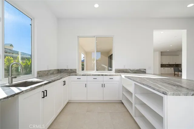 a view of a room with a large window