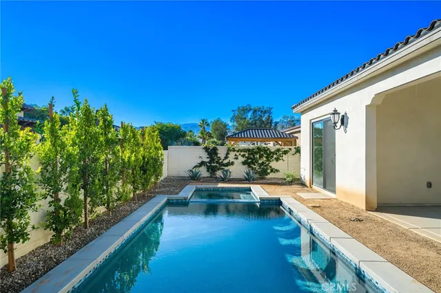 a front view of a house with a patio