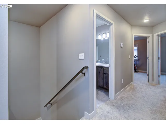 a view of a hallway with an entryway