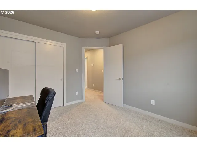 a workspace with furniture and a window