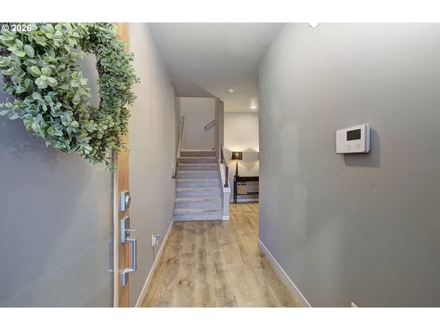 a view of entryway with wooden floor