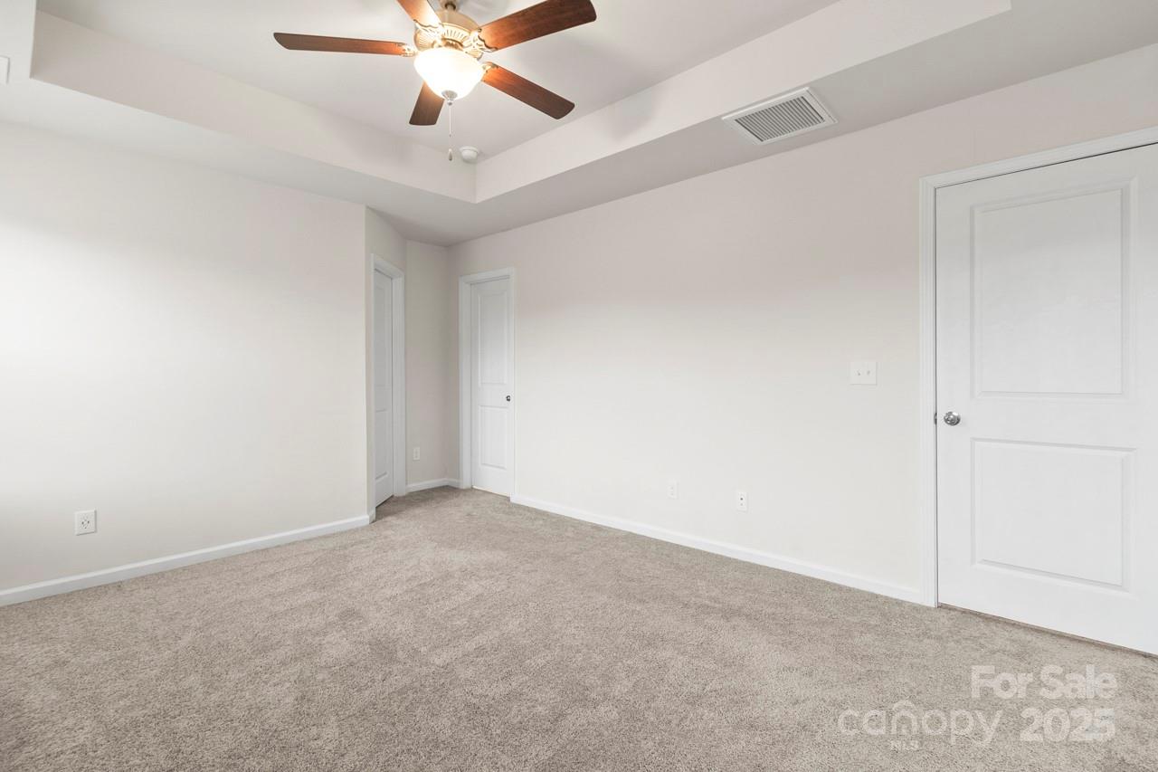 3776 Yorkshire Place Terrell, NC 28682 - Photo 23 of 47 an empty room with chandelier fan