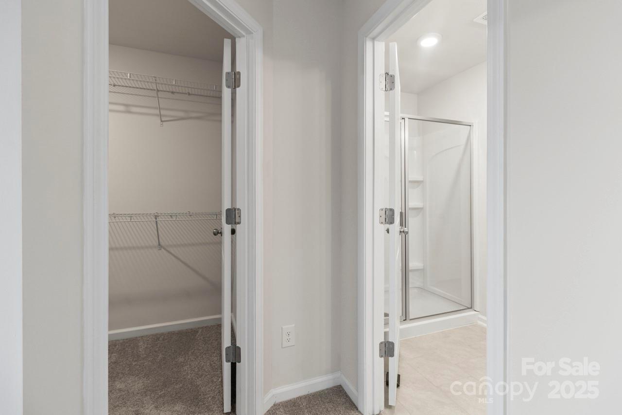 3776 Yorkshire Place Terrell, NC 28682 - Photo 31 of 47 a bathroom with a glass shower door