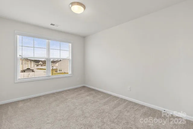a view of a bathroom with a glass door