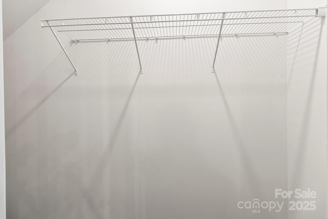 3776 Yorkshire Place Terrell, NC 28682 - Photo 40 of 47 a bathroom with a shower curtain and a shower