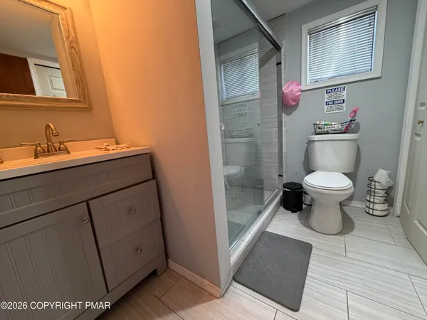 a bathroom with a sink and a toilet
