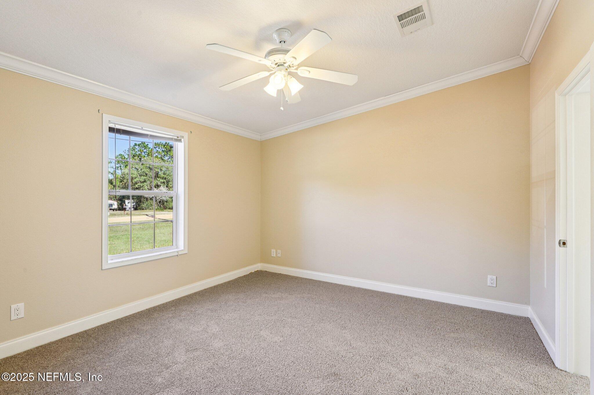 5827 Hillridge Road Keystone Heights, FL 32656 - Photo 20 of 57 Primary Bedroom