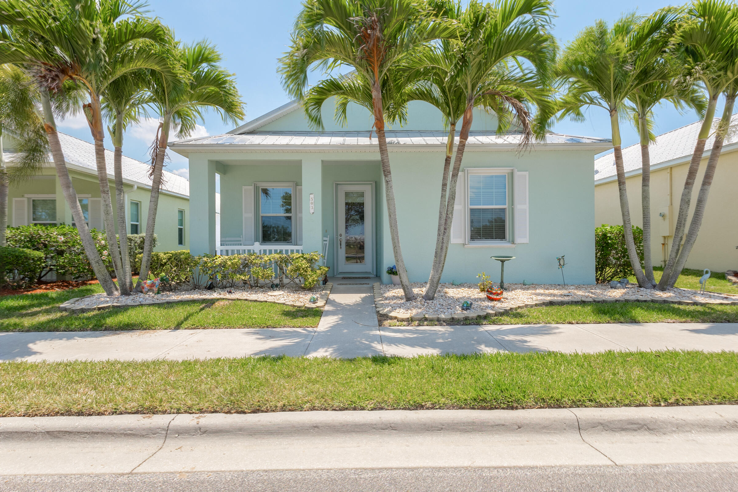 503 Heming Way Melbourne, FL 32901 - Photo 1 of 33 a front view of a house with garden and porch