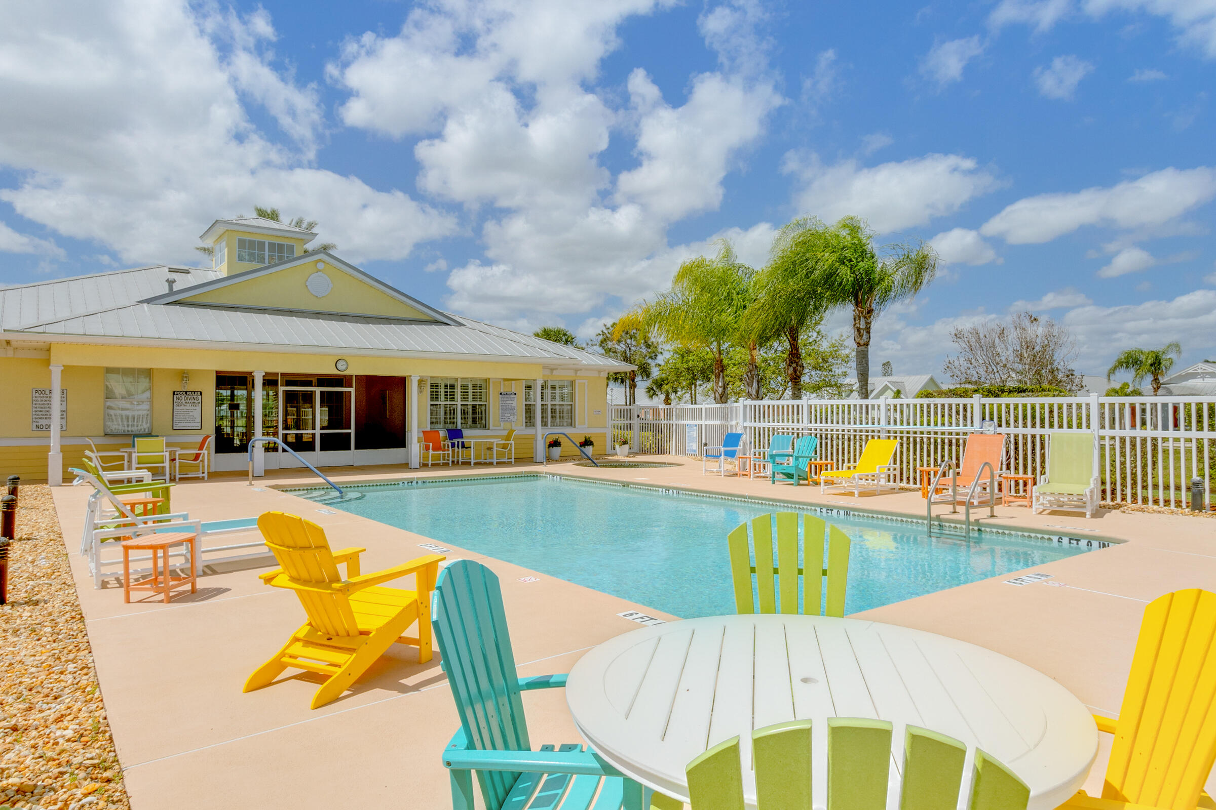 503 Heming Way Melbourne, FL 32901 - Photo 24 of 33 a view of a swimming pool with a lounge chairs