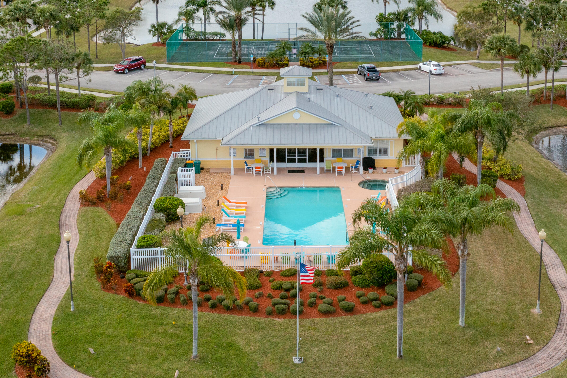 503 Heming Way Melbourne, FL 32901 - Photo 32 of 33 an aerial view of a house with a garden and lake view