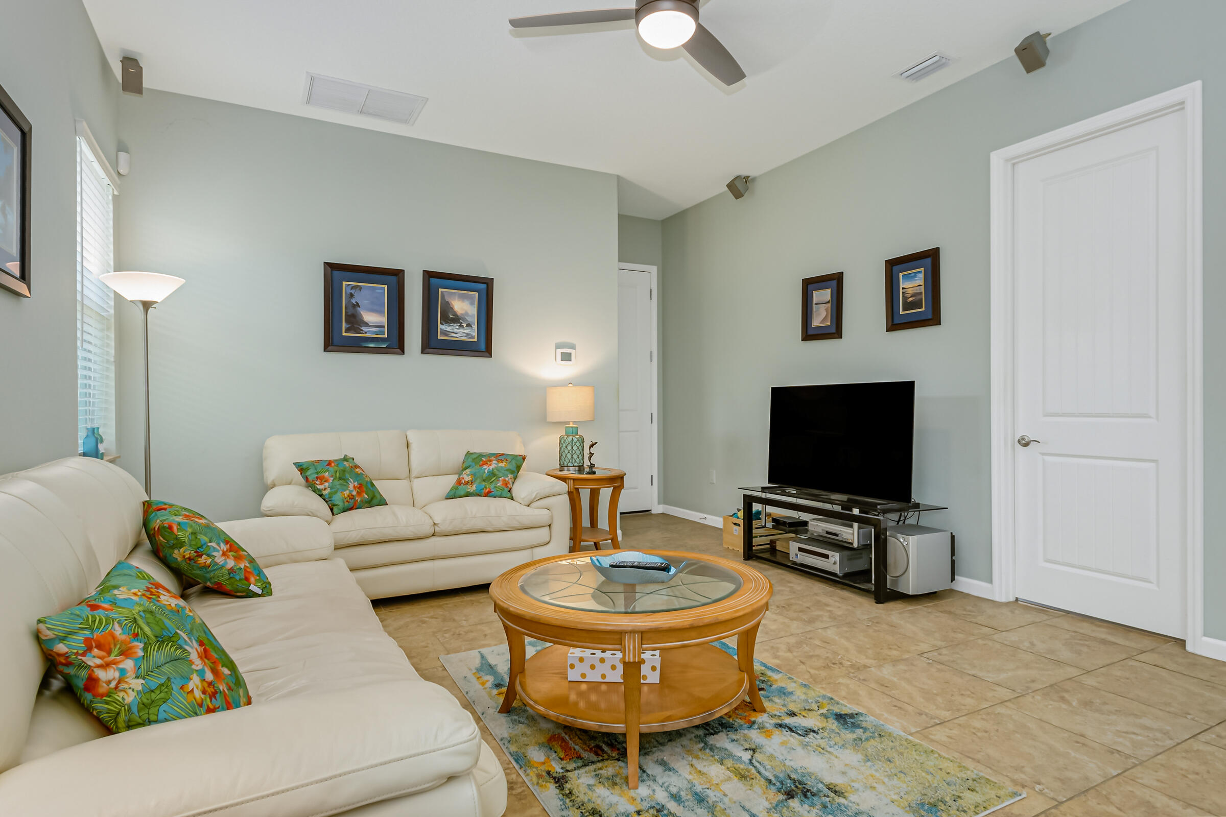 503 Heming Way Melbourne, FL 32901 - Photo 9 of 33 a living room with furniture and a flat screen tv