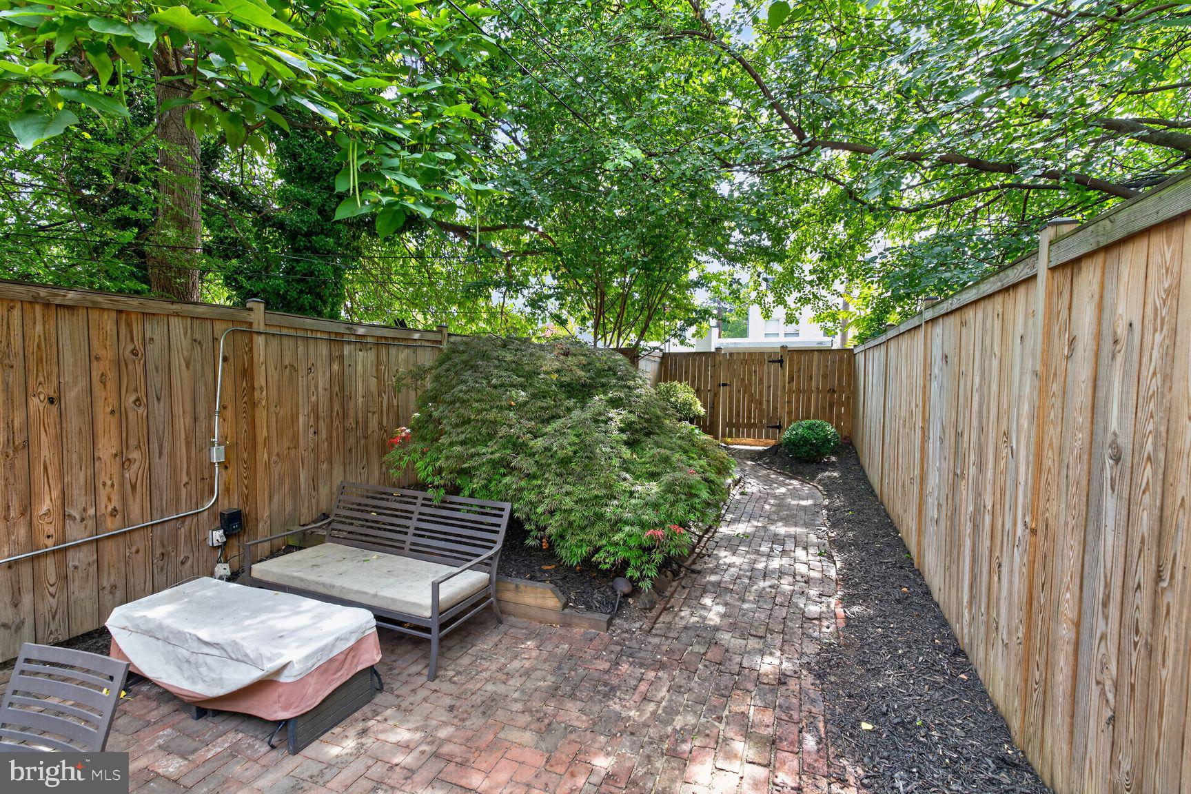 641 11th Street Northeast Washington, DC 20002 - Photo 20 of 22 Serene garden retreat with lush greenery.