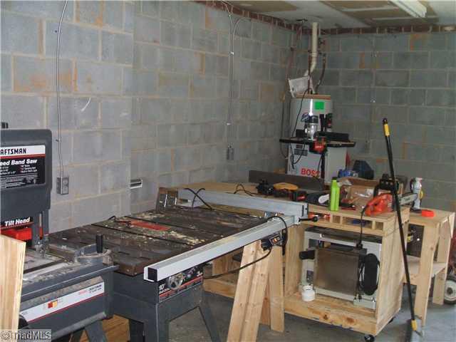 344 Clay Flynt Road Kernersville, NC 27284 - Photo 15 of 15 Workshop. Large double car garage with great workshop area.
