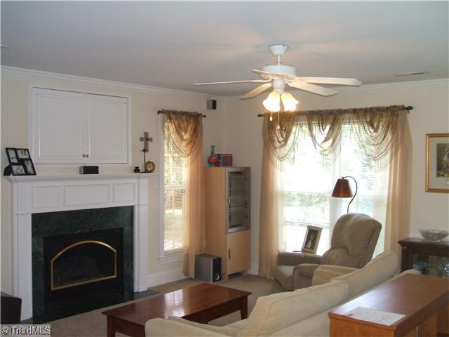 344 Clay Flynt Road Kernersville, NC 27284 - Photo 6 of 15 Living Room. Well lit LR with gas log fireplace and buiit in TV Cabinet above