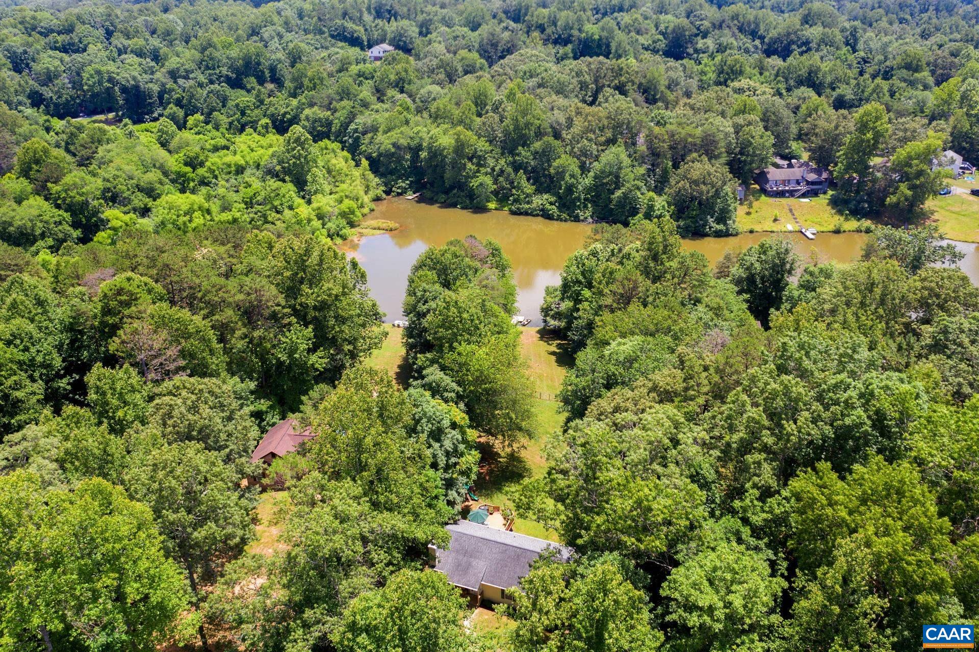 793 Geranium Road Ruckersville, VA 22968 - Photo 1 of 31 a view of a house with a yard