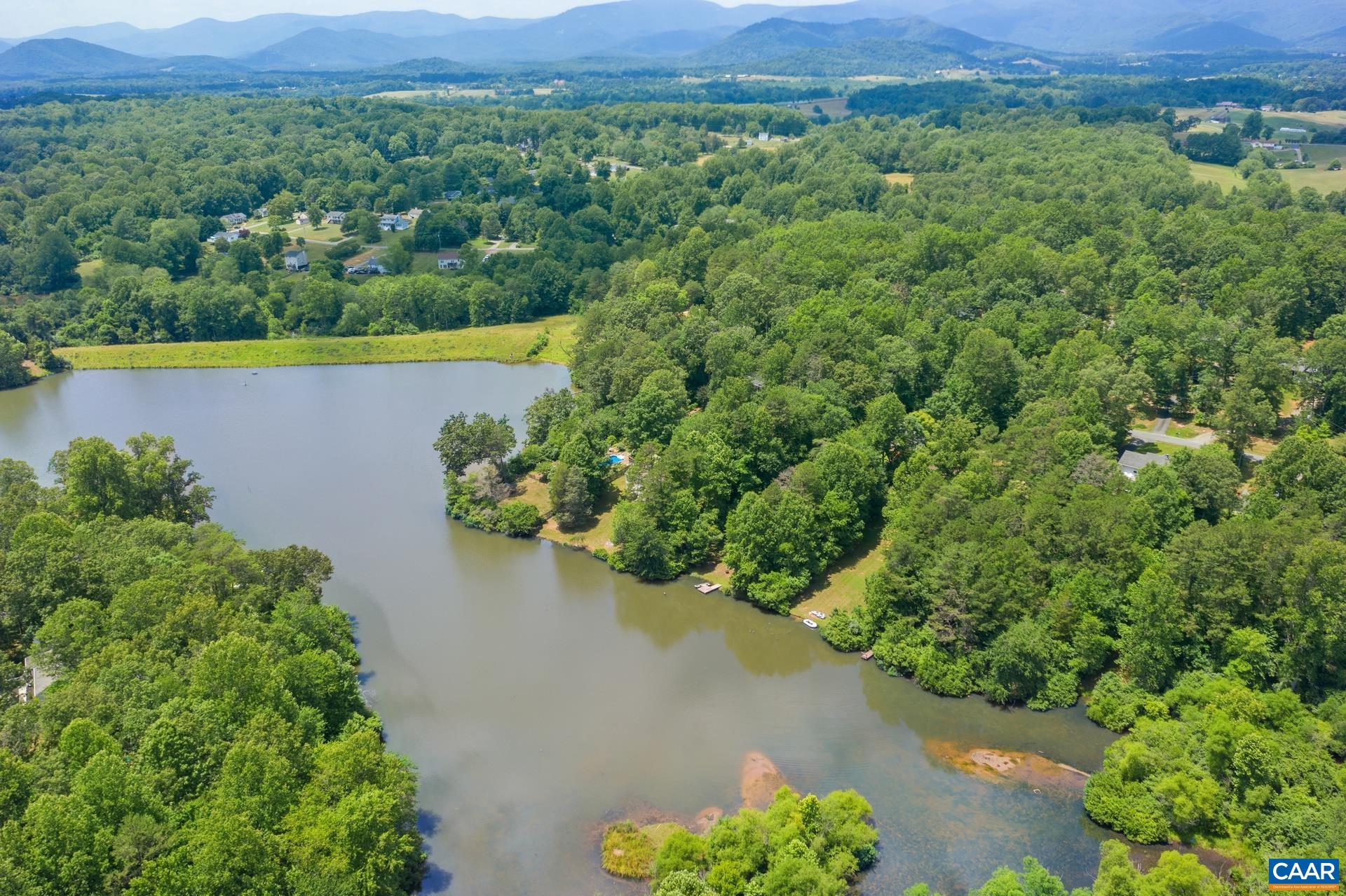 793 Geranium Road Ruckersville, VA 22968 - Photo 30 of 31 an aerial view of a house with a yard