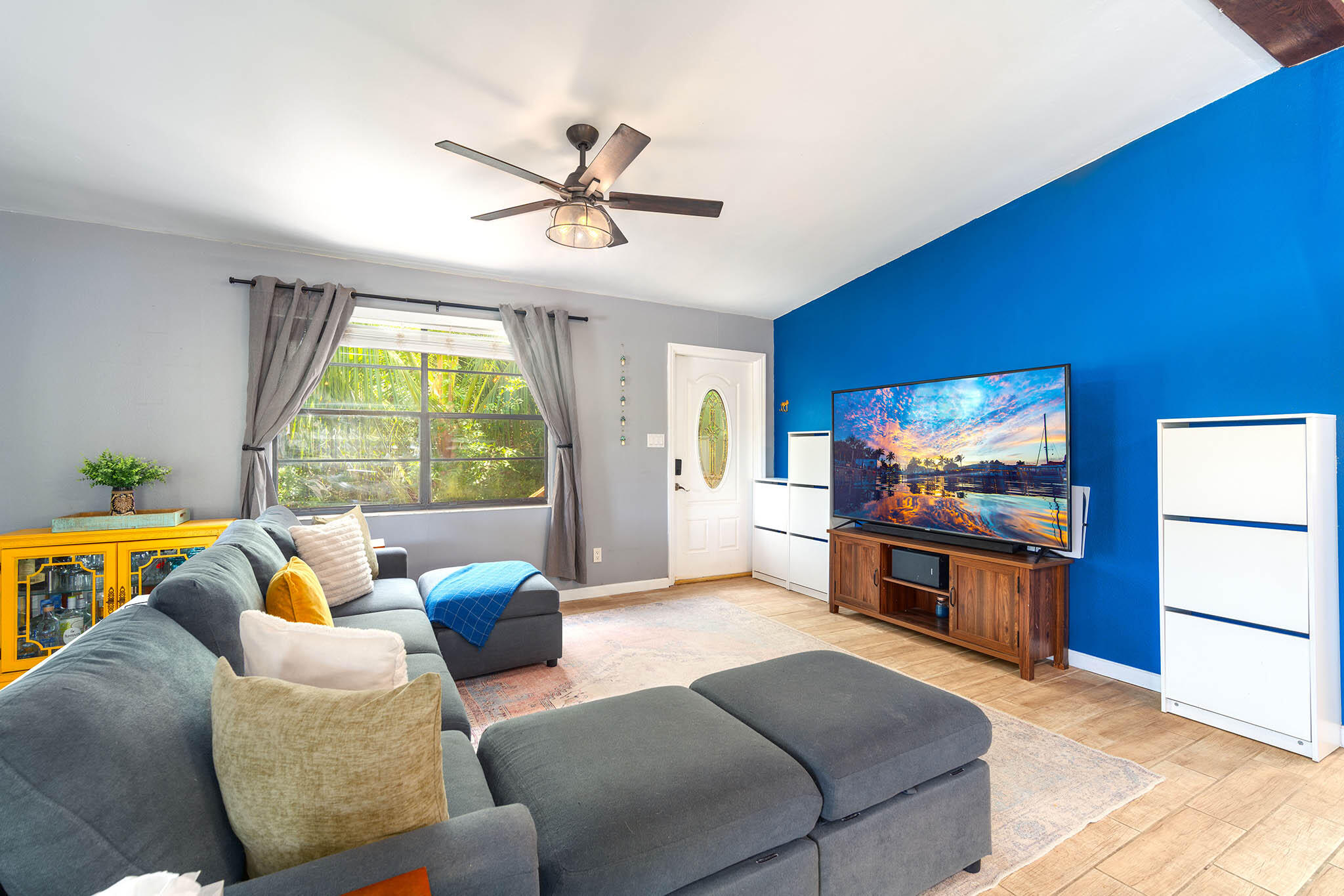 29951 Pine Channel Road Big Pine Key, FL 33043 - Photo 18 of 61 a living room with furniture and a flat screen tv
