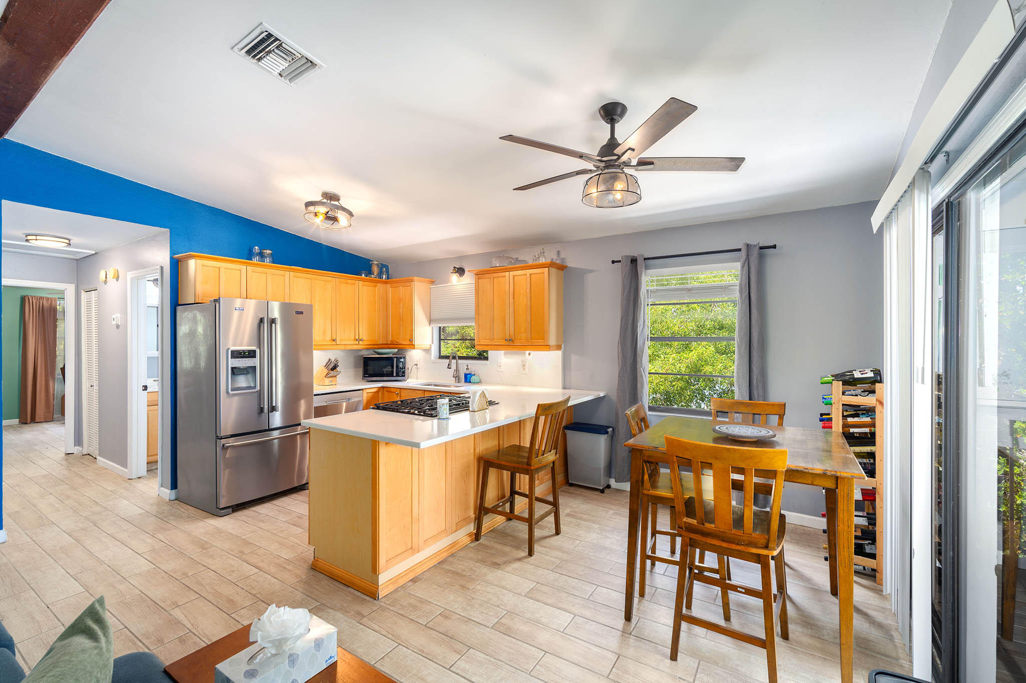 29951 Pine Channel Road Big Pine Key, FL 33043 - Photo 20 of 61 a view of a kitchen with a table and chairs
