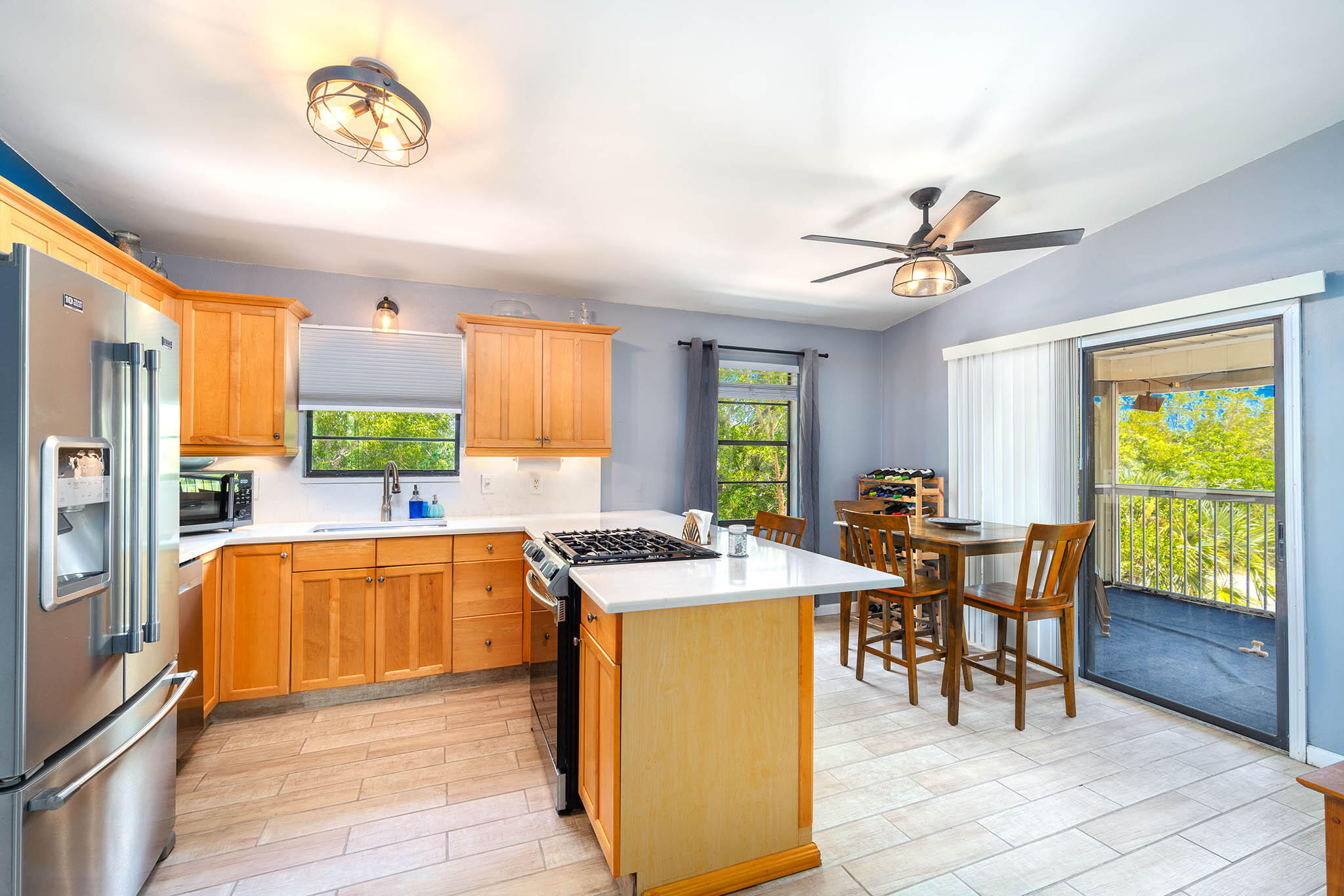 29951 Pine Channel Road Big Pine Key, FL 33043 - Photo 22 of 61 a view of a dining room with furniture window and outside view