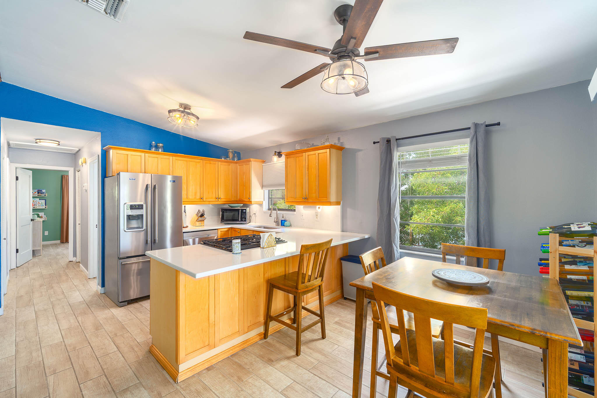 29951 Pine Channel Road Big Pine Key, FL 33043 - Photo 25 of 61 a very nice looking dining room with a large window a table and chairs