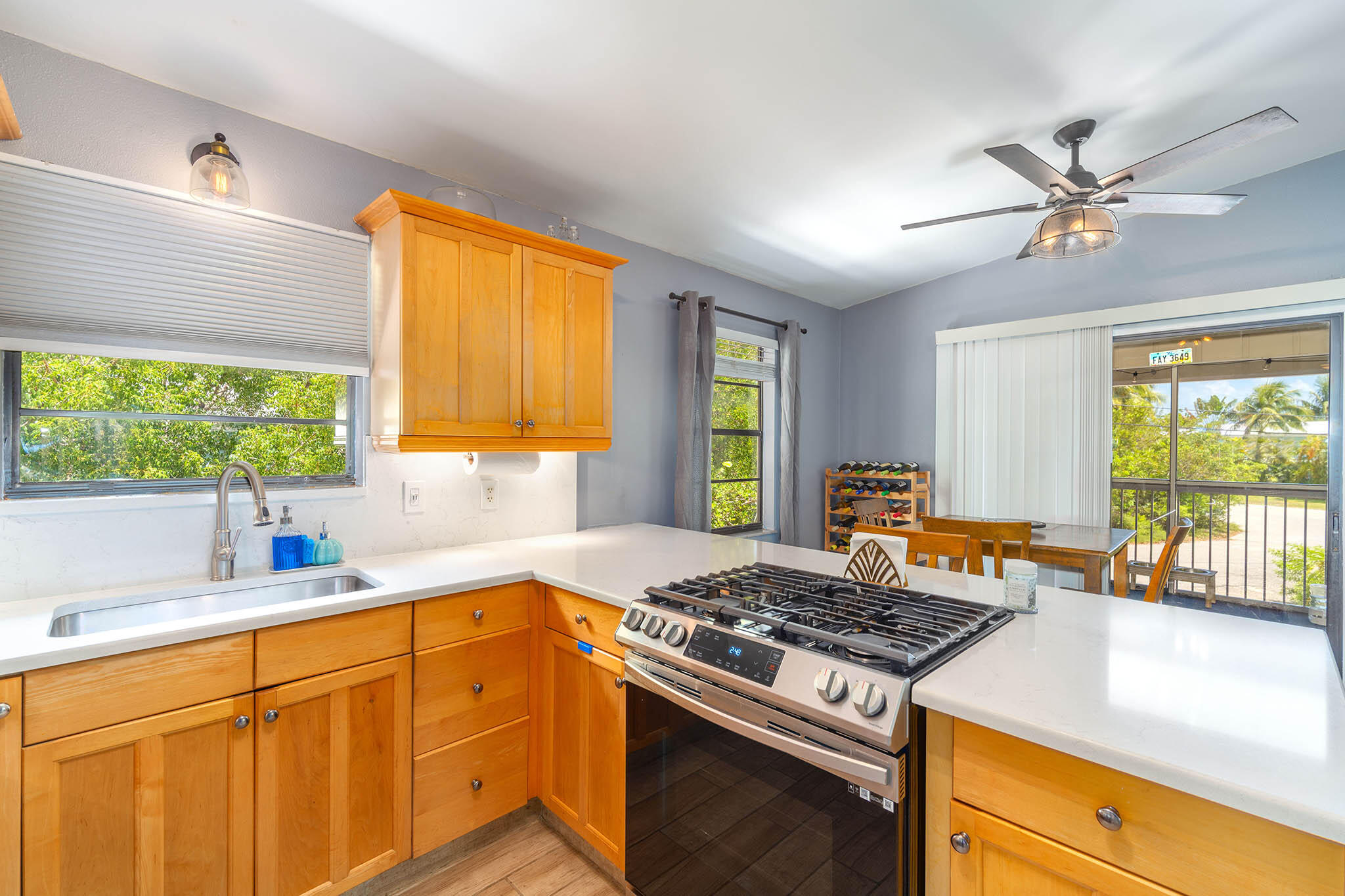 29951 Pine Channel Road Big Pine Key, FL 33043 - Photo 29 of 61 a kitchen that has a sink and a stove
