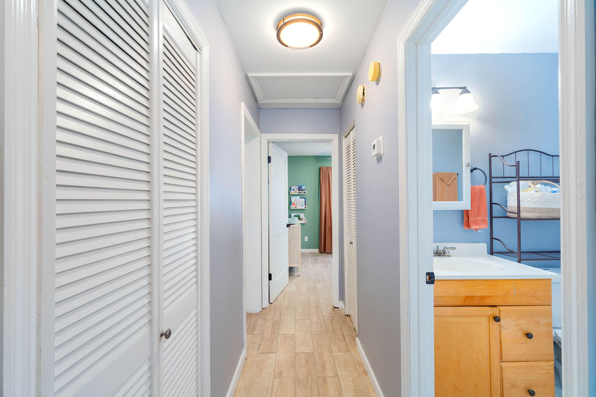 29951 Pine Channel Road Big Pine Key, FL 33043 - Photo 33 of 61 a view of a hallway with wooden floor