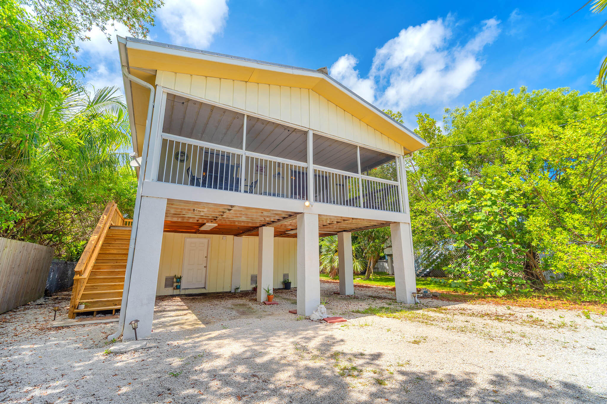 29951 Pine Channel Road Big Pine Key, FL 33043 - Photo 50 of 61 a view of a house with a backyard