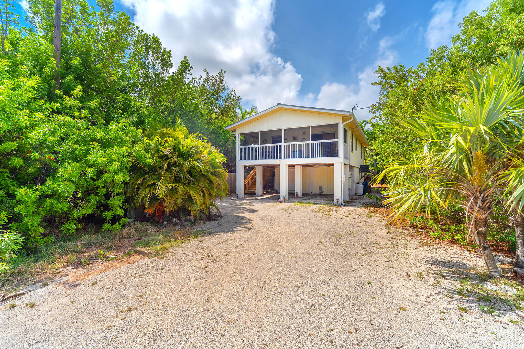 29951 Pine Channel Road Big Pine Key, FL 33043 - Photo 52 of 61 a front view of a house with a yard