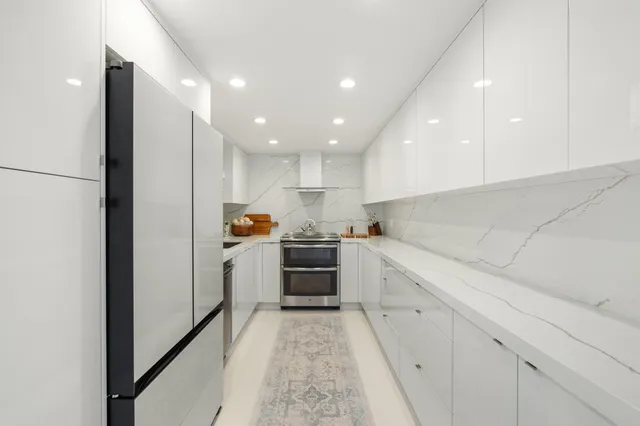 a bedroom with a bed and walk in closet