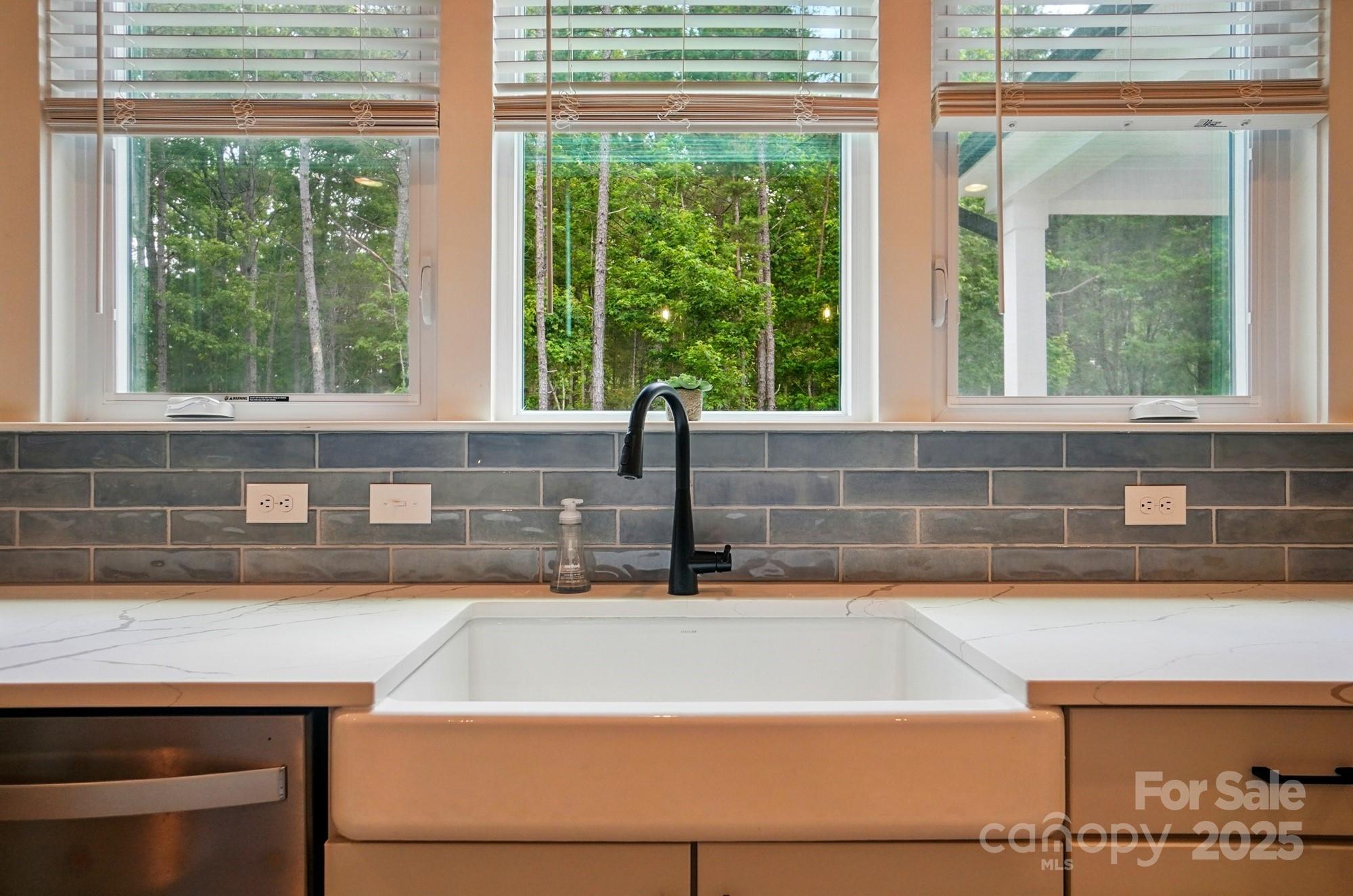 7818 Russell Road Indian Trail, NC 28079 - Photo 14 of 42 a kitchen with a sink and a window