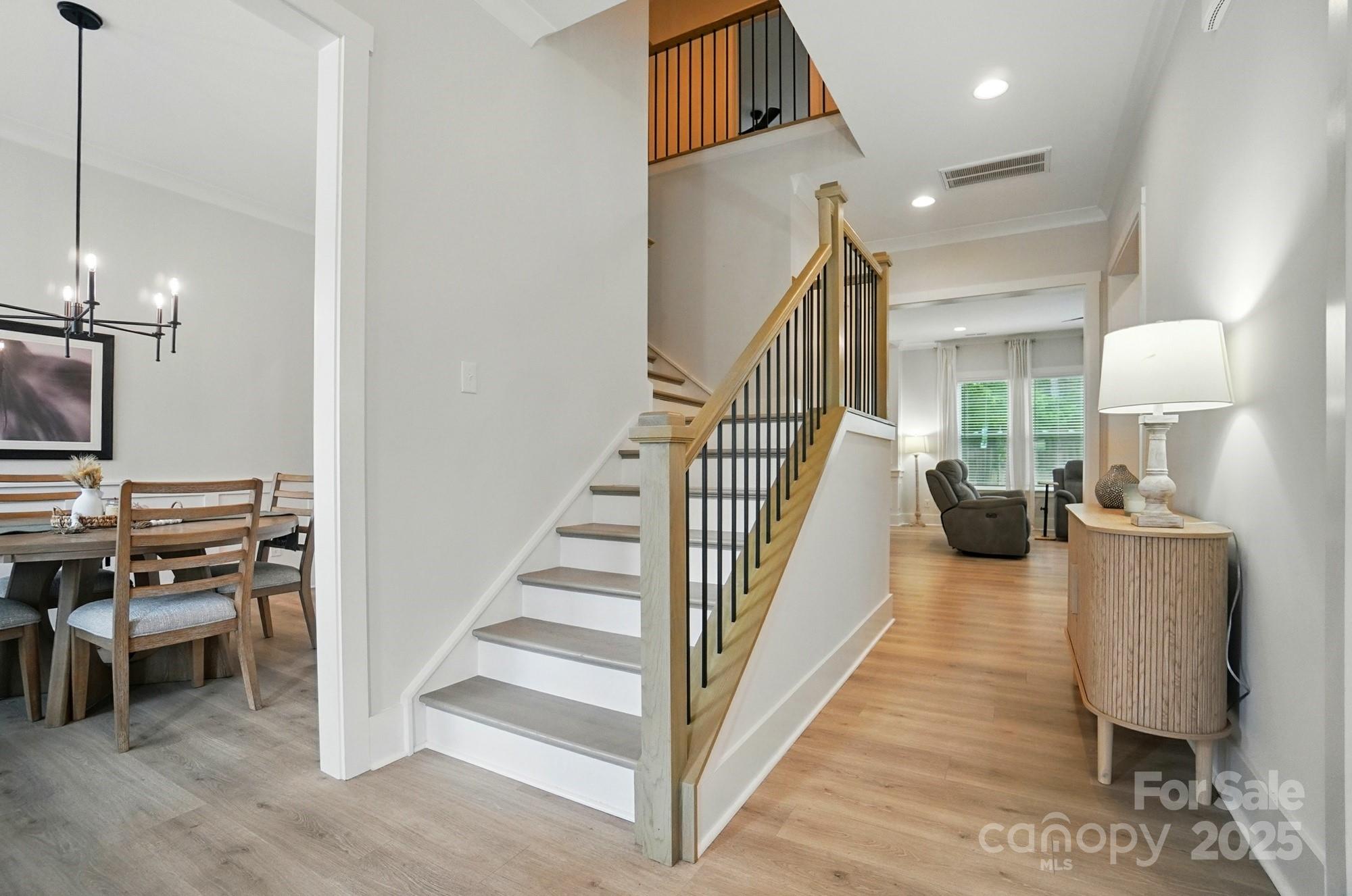 7818 Russell Road Indian Trail, NC 28079 - Photo 5 of 42 a view of a livingroom with furniture and staircase