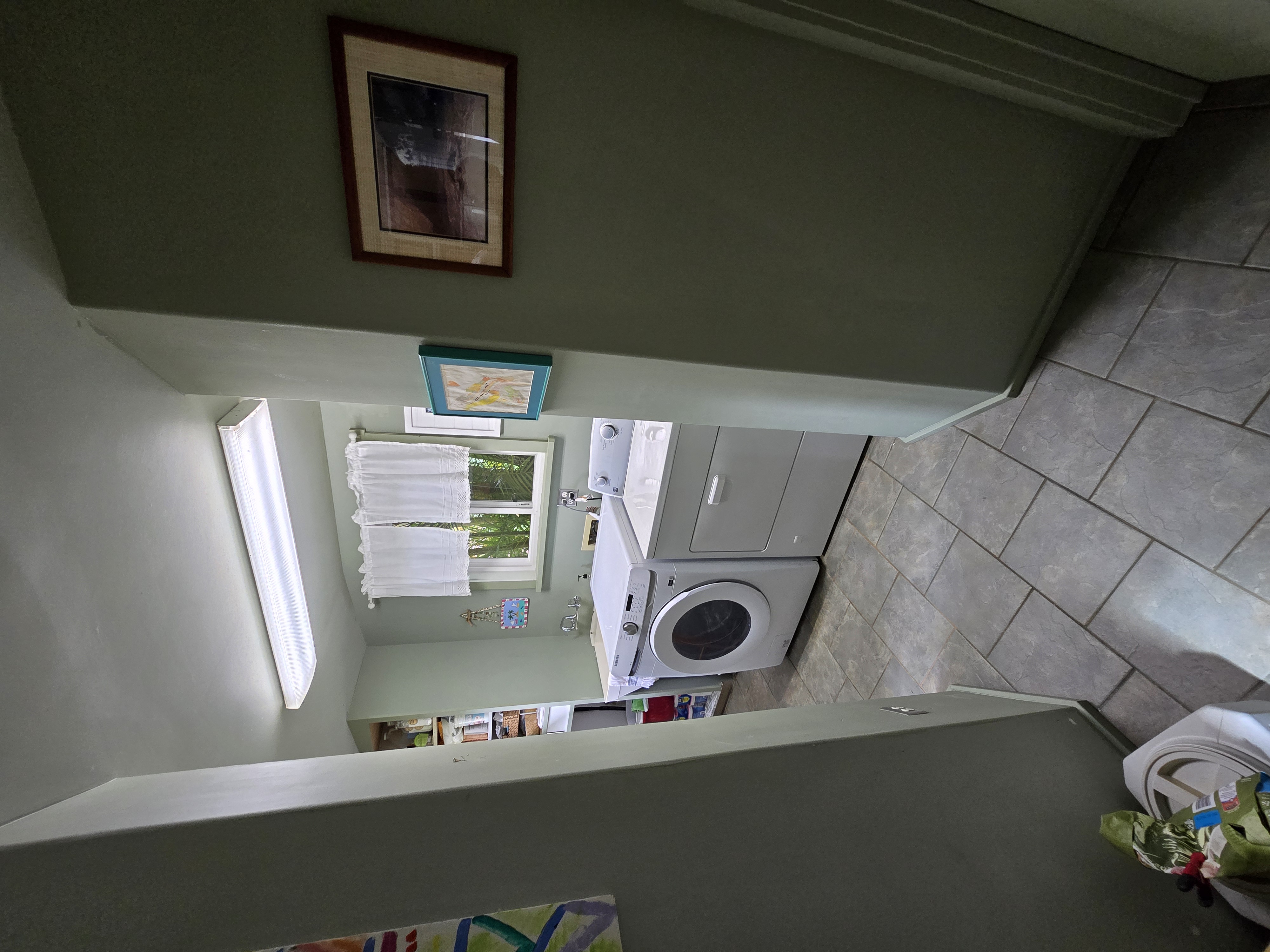 6562 Kahuna Road Kapaa, HI 96746 - Photo 11 of 14 a utility room with dryer and washer