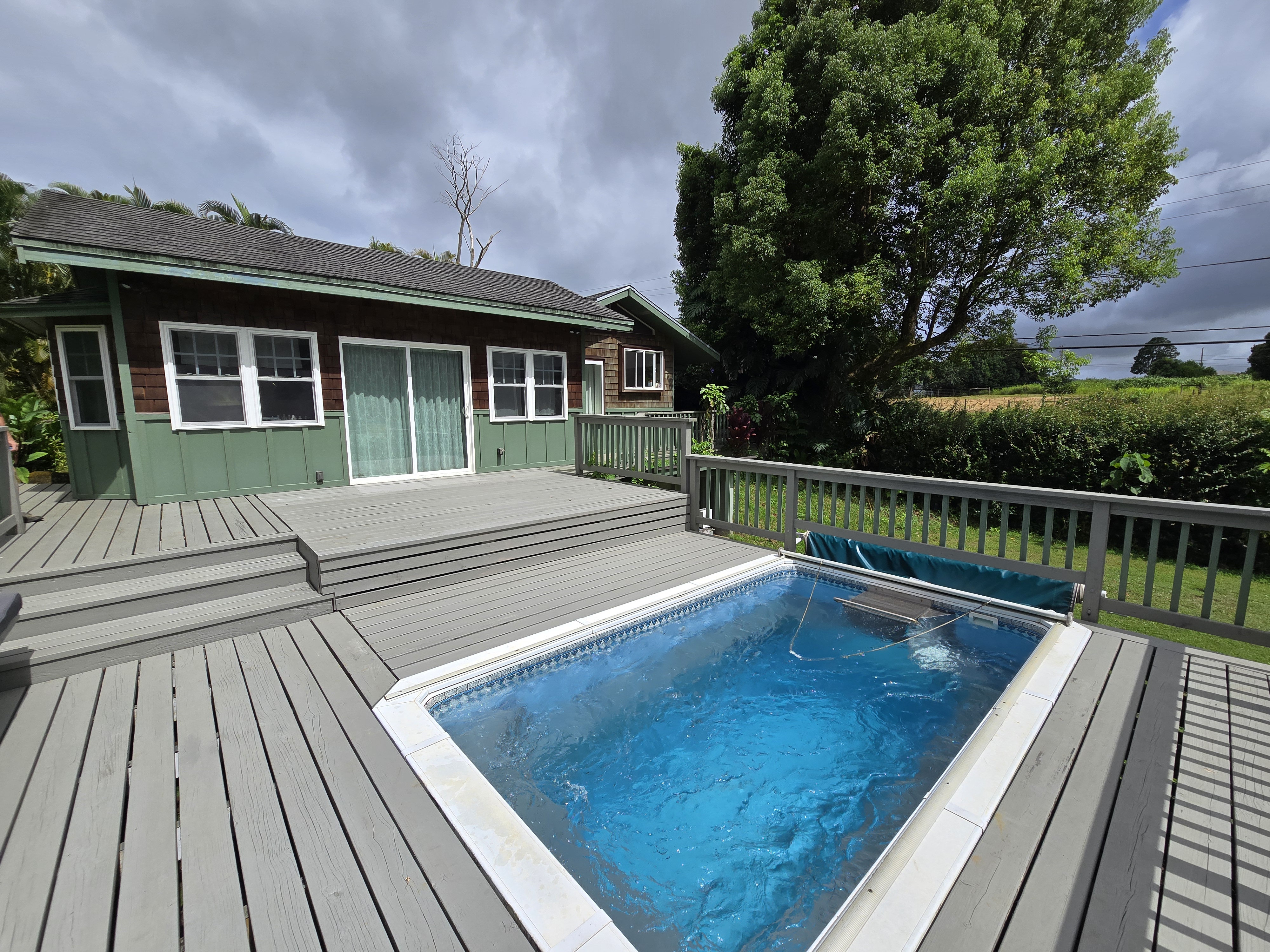 6562 Kahuna Road Kapaa, HI 96746 - Photo 3 of 14 a view of house with a deck