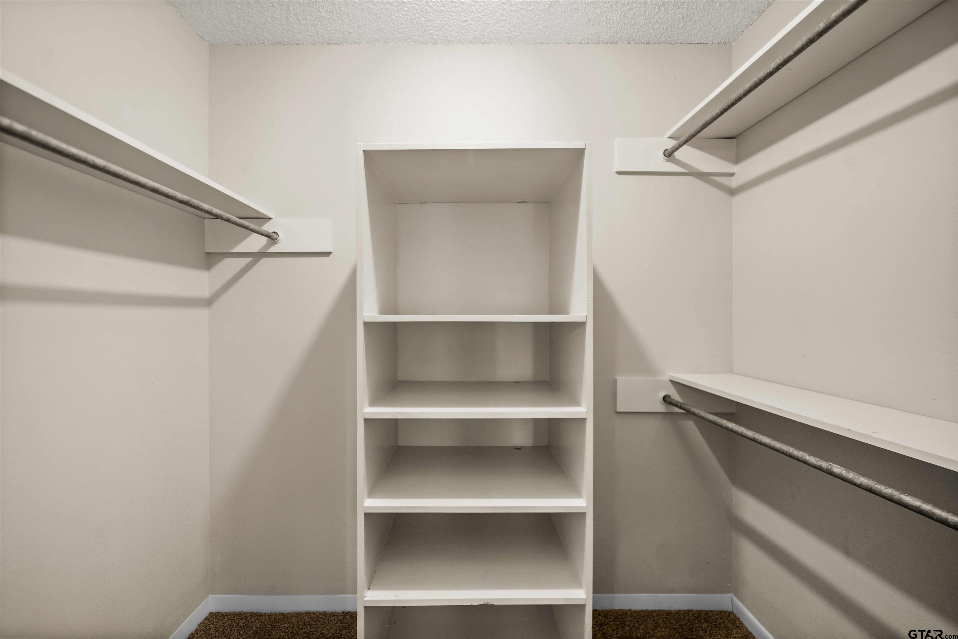 13518 Larry Lane Tyler, TX 75709 - Photo 15 of 28 a view of an empty walk in closet